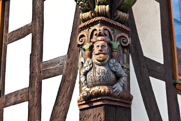 Carvings in the frame work of an old medieval house — Stock Photo, Image