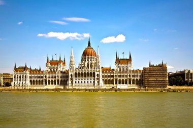 Famous parliament of Hungary in Budapest, view over river danubi clipart