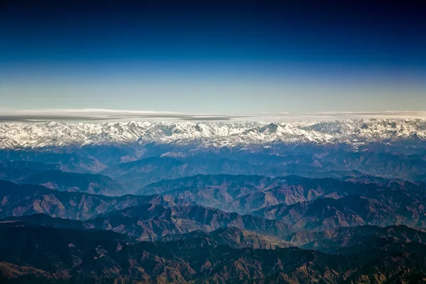 Flying over the Himalaya in the morning with sunrise — Stock Photo, Image