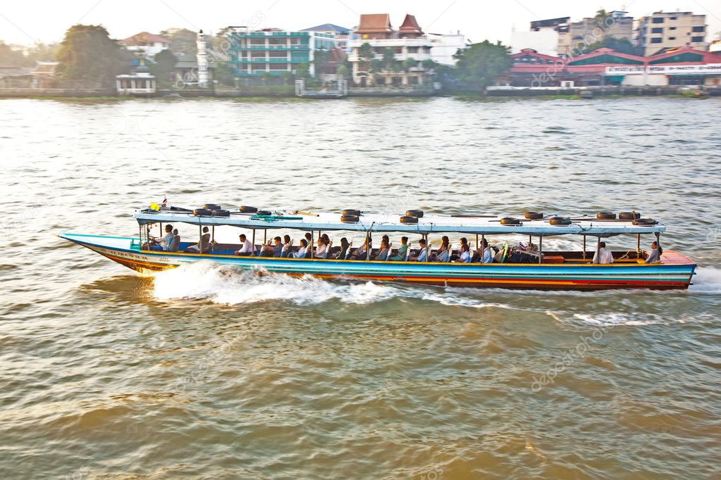 Transportation on the river in Bangkok in sunrise in a ferry