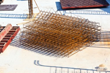 Material at a construction site for the base of a new house clipart