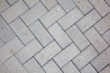 Pavement pattern made with cast concrete blocks in grey color clipart