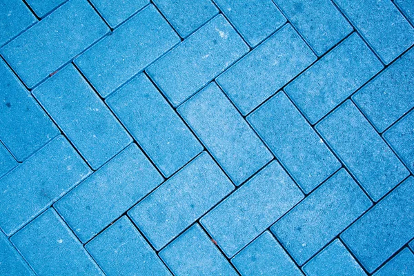 在蓝色颜色与铸混凝土块取得的路面模式 — 图库照片
