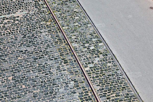 Velha rua de pedra calçada — Fotografia de Stock