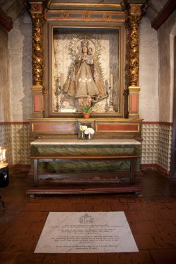 Inside the monastery of Carmel Mission in Monterrey clipart