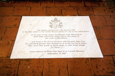 Inside the monastery of Carmel Mission in Monterrey clipart