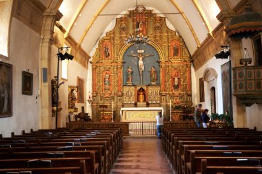 Inside the monastery of Carmel Mission in Monterrey clipart