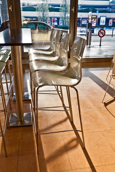 Bar chair in early morning light at the Airport in hamburg — Stock Photo, Image