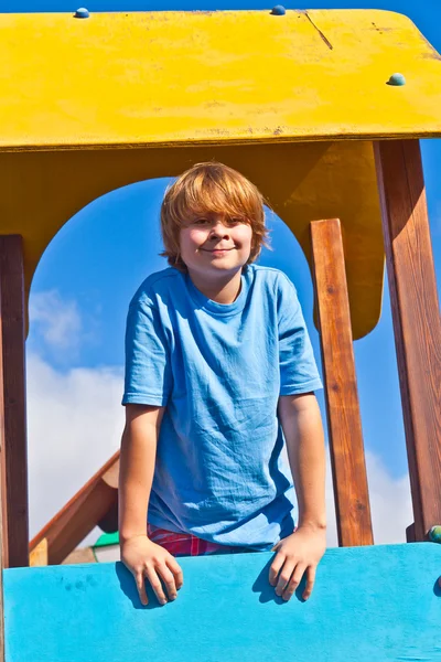 Portrait of happy teenager at a playground — Stock Photo, Image