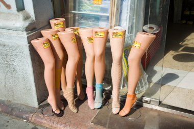 Pantihose on puppets legs in a shop clipart