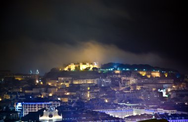 Lisbon, view to castle Castel Sao Jorge by night clipart