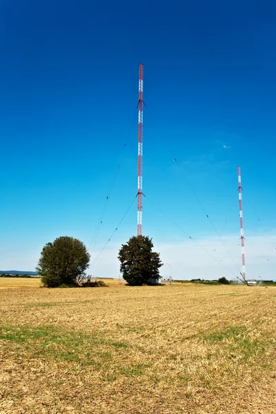 stock image Radio installation in golden acres with blue sky