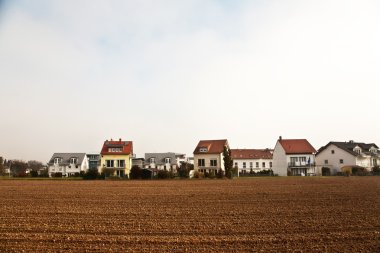 New settlement on the boarder of acres, building site for detached houses clipart