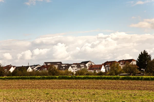 New housing area near the acre in beautiful landscape in middle of the farm — Stock Photo, Image