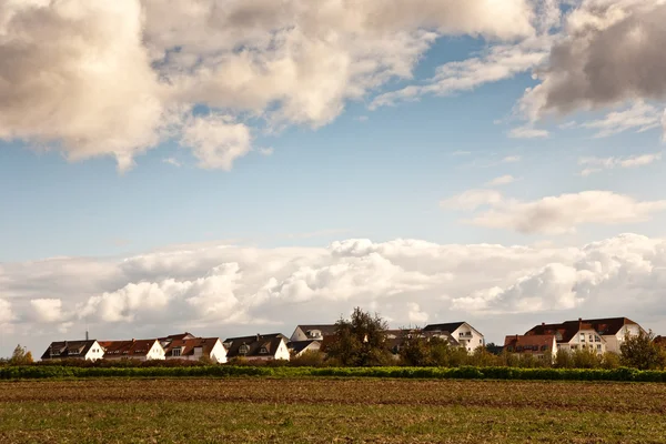 New housing area near the acre in beautiful landscape in middle of the farm — Stock Photo, Image