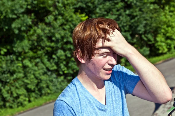 Portrait of cute boy sweating after sports — Stock Photo, Image