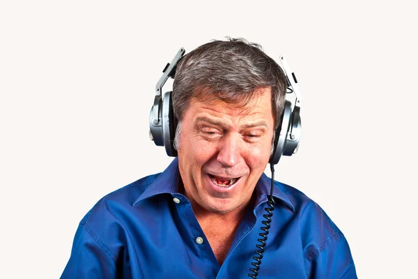 Happy man listening with headphones music — Stock Photo, Image