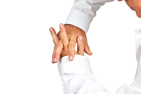 Homem com as mãos dobradas — Fotografia de Stock