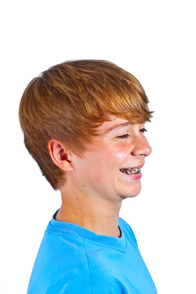 Boldog fiú kék ing stúdióban portré — Stock Fotó
