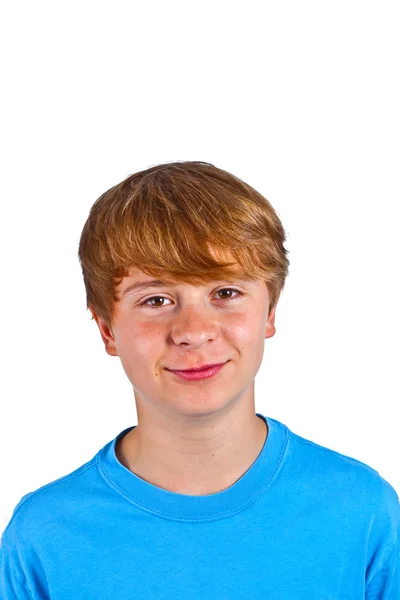 Portret van gelukkige jongen met blauw shirt in studio — Stockfoto