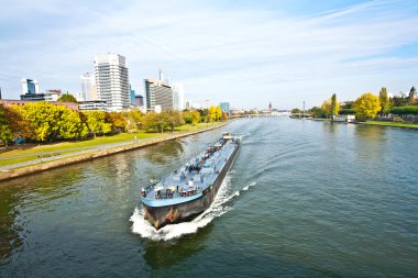 Freight ship on the river Main in Frankfurt clipart