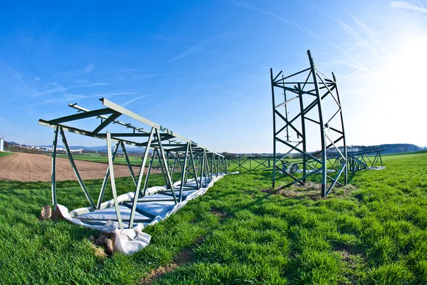 Construction site with electrical tower — Stock Photo, Image
