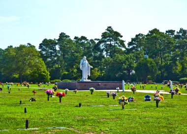 American cemetery with flowers at the graves clipart