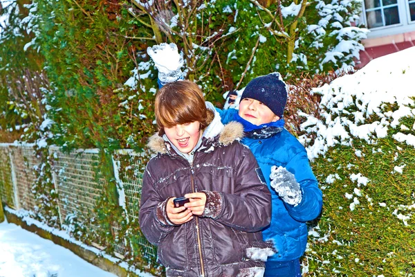 Boy has fun in winter landscape in snow — Stock Photo, Image