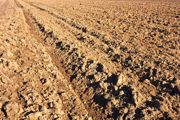 stock image Closeup of a plowed field prepared for new planting.