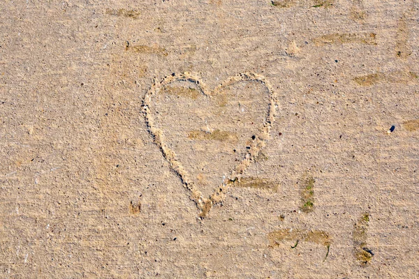 Heart drawn in concrete pathway — Stock Photo, Image