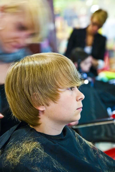 Garcon Aux Longs Cheveux Roux A L Air Critique Cafe Portrait Stock Photo