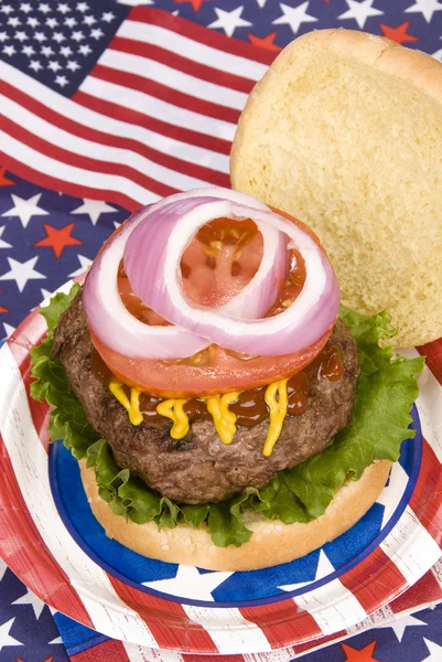 Juicy fourth of July hamburger — Stock Photo, Image