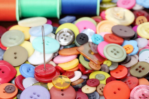 Needle and buttons — Stock Photo, Image