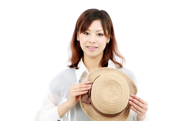 Portrait of young woman with a hat — Stock Photo, Image