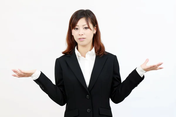 Confused young business woman — Stock Photo, Image