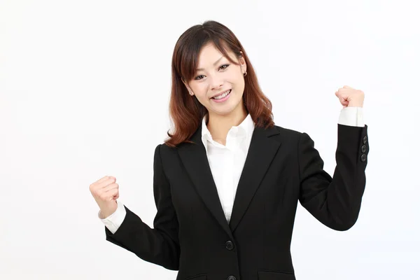 Empresaria asiática alzando sus brazos en señal de victoria —  Fotos de Stock