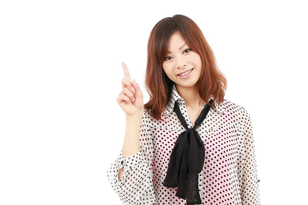 Jovem asiático mulher de negócios apontando — Fotografia de Stock