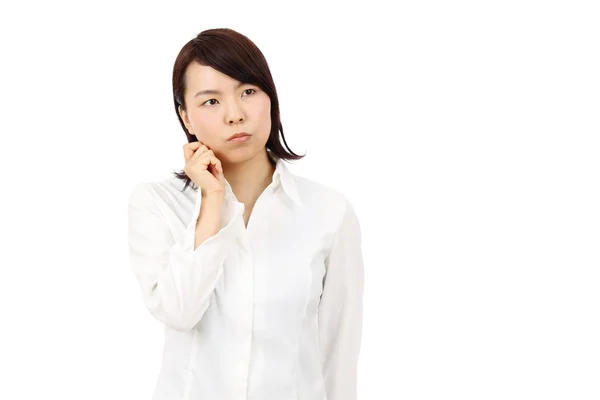Portrait of young asian business woman thinking — Stock Photo, Image
