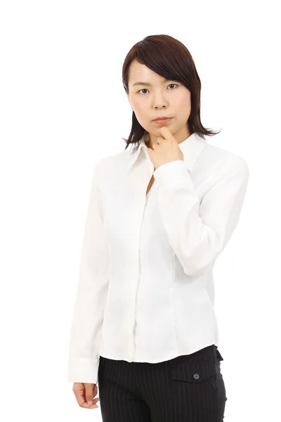 Porträtt av ung asiatiska affärskvinna tänkande — Stockfoto