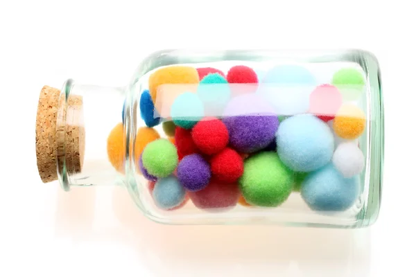 Bolas de algodón en una botella —  Fotos de Stock