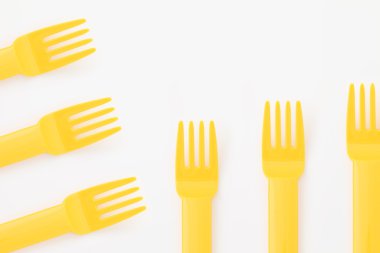 Yellow plastic forks clipart