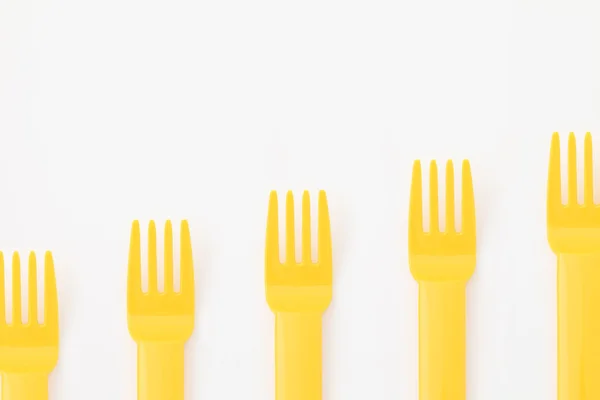 Gele plastic vorken — Stockfoto
