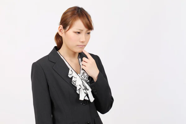 Young asian business woman thinking — Stock Photo, Image