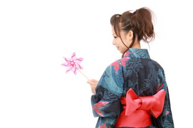 Japanese woman in traditional clothes of Kimono clipart
