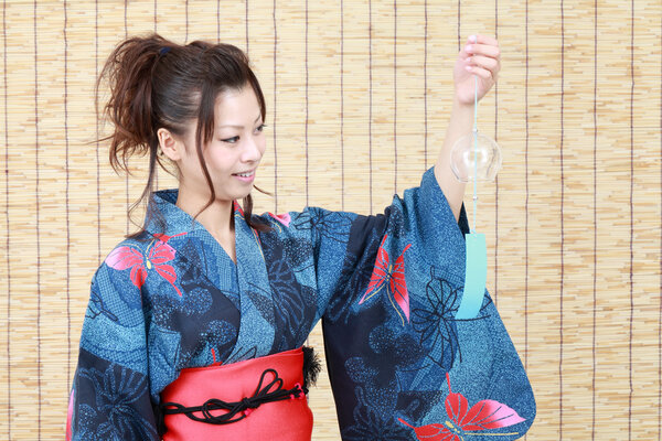 Japanese woman in traditional clothes of Kimono