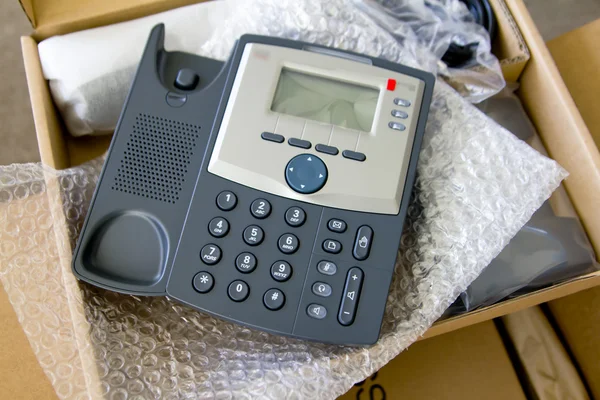 Новый VoIP телефон в комплекте Стоковая Картинка