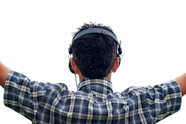 Niño disfrutando de la música, auriculares en la cabeza — Foto de Stock