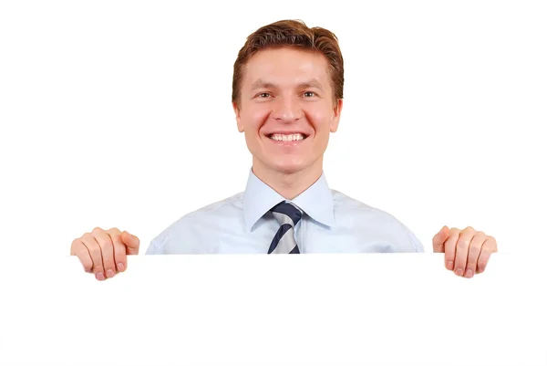 Jistý obchodní muž držící bílou tabuli pro kopírování prostor — Stock fotografie