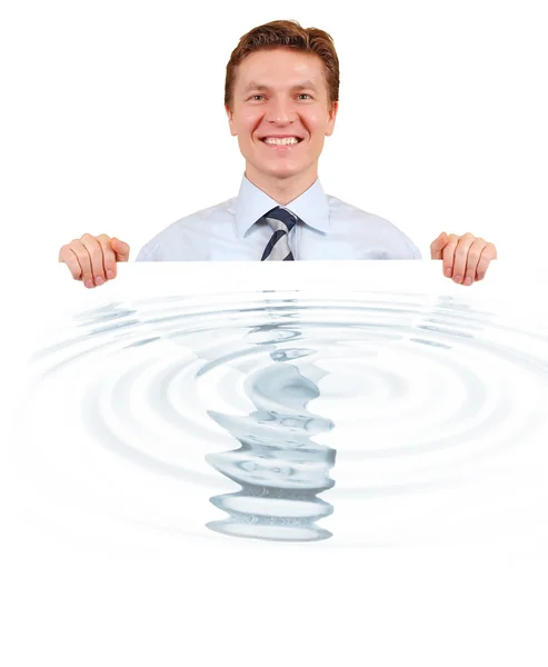 Negócios confiantes segurando uma placa branca com reflexão de água — Fotografia de Stock