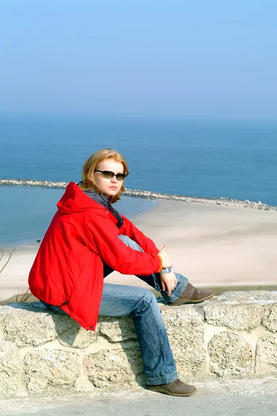 stock image Beautiful young woman with sunglasses at seaside